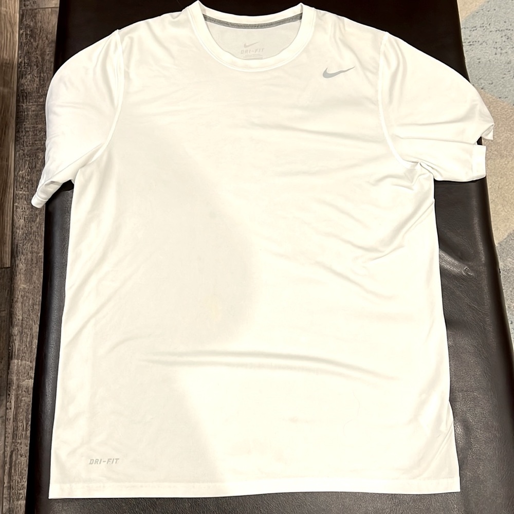 White dri -fit Nike shirt size Large loose fit!